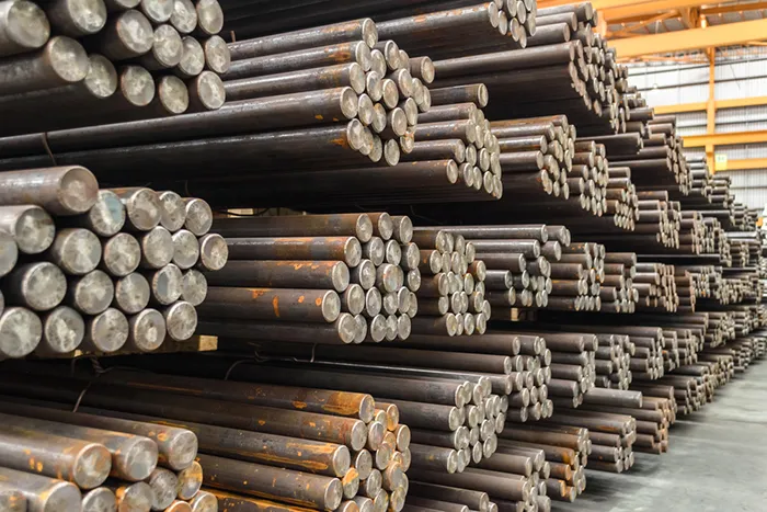 Tool steel stock held ready for cutting
