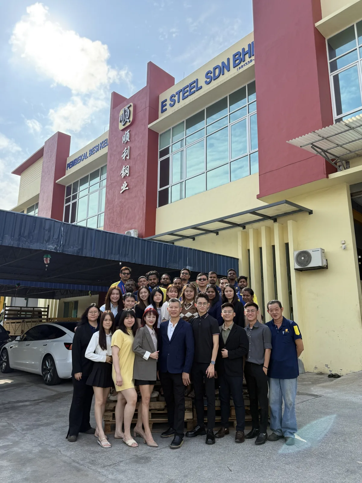 The E STEEL SDN BHD team gathered outside the Klang office