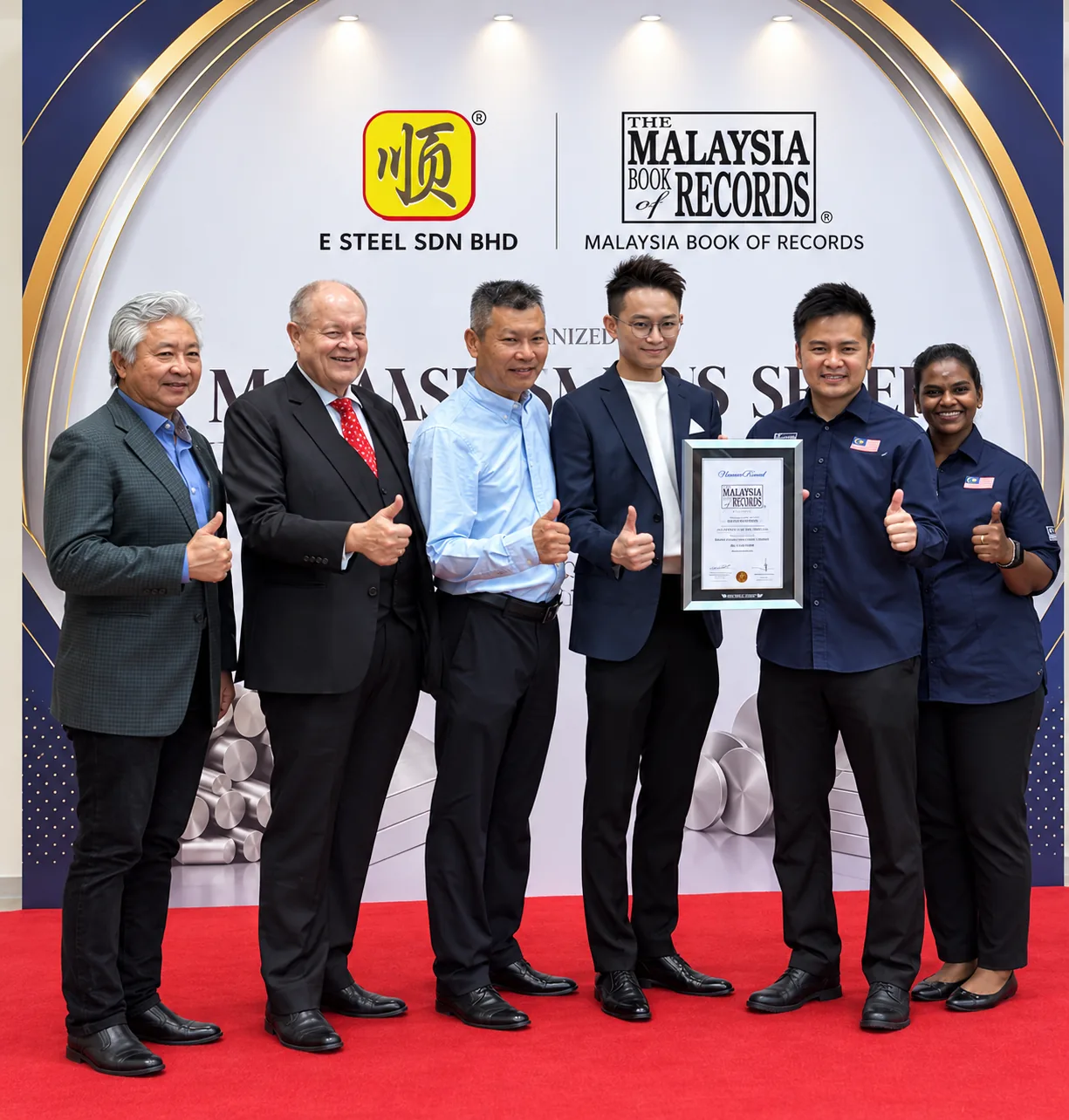 E STEEL SDN BHD team receiving the Malaysia Book of Records award for most stainless steel grades by a supplier